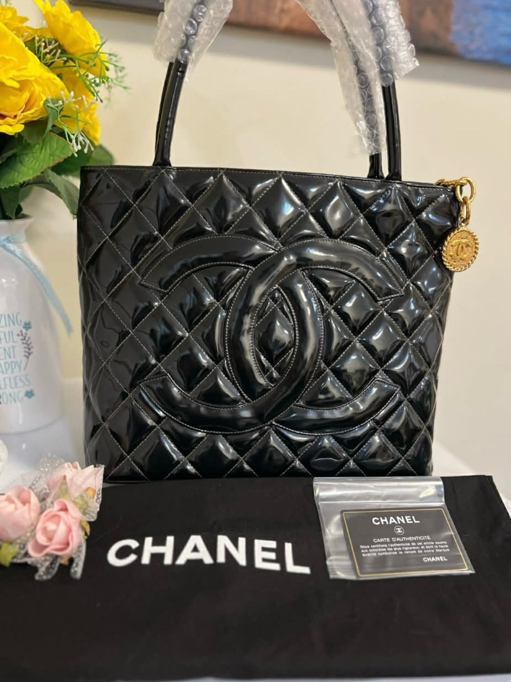 CHANEL Black Quilted Patent Leather Tote with CC Medallion